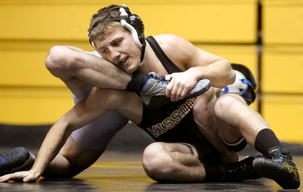 Missouri wrestler shows unique side off the mat
